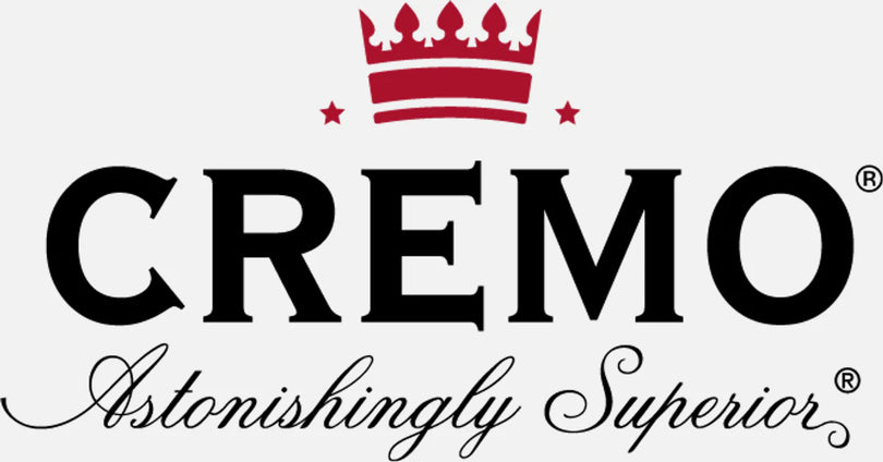 The Cremo logo shows bold black text with a red crown above and the slogan “Astonishingly Superior” in cursive below.