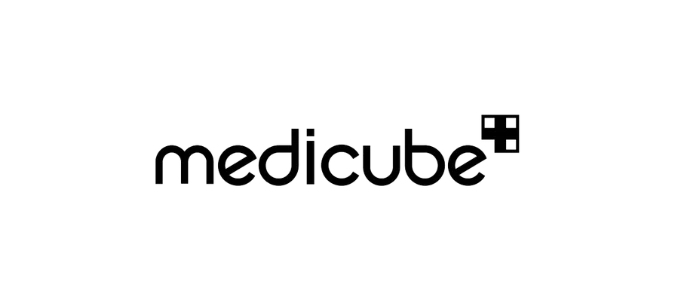 The Medicube logo shows the word “medicube” in lowercase letters with a clean, modern style, followed by a small square icon made of four smaller squares on the upper right.