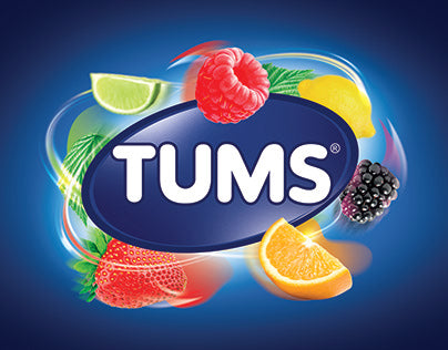 The TUMS logo features bold white text in a dark blue oval, surrounded by colorful fruit images, symbolizing its fruity flavors and fast relief.