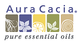 The Aura Cacia logo shows the name in purple above five colorful icons of a plant, flower, citrus, leaves, and tree rings, with the tagline “pure essential oils.”