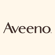 The Aveeno logo features the brand name in a simple, dark brown serif font on a light, creamy background, reflecting a natural and soothing brand identity.