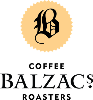 The Balzac's Coffee Roasters logo shows a black gothic-style “B” in a beige circle above the word “BALZAC’S” in bold, uppercase serif font.
