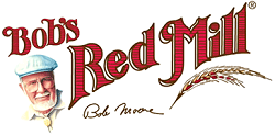 The Bob's Red Mill logo shows bold red text with a wheat stalk and a smiling portrait of founder Bob Moore wearing a blue cap and glasses.