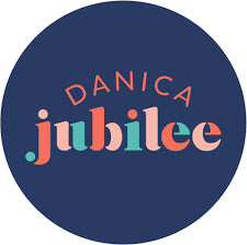 The Danica Jubilee logo shows the word “Danica” above “jubilee” in colourful, playful letters inside a dark blue circle.