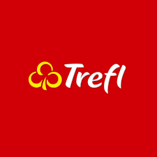 The Trefl logo features the word “Trefl” in white cursive lettering beside a yellow four-leaf clover symbol on a bright red background.