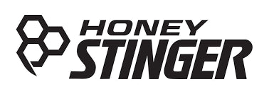 The Honey Stinger logo shows bold black text with a stylized honeycomb and stinger symbol on the left, highlighting its honey-based energy theme.