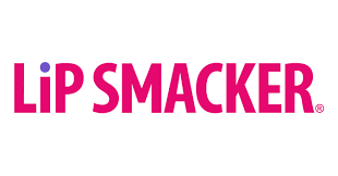 The Lip Smacker logo features bold, uppercase letters in bright pink with a playful purple dot above the “i” in “LiP,” reflecting the brand’s fun and youthful personality.