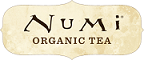 The Numi Tea logo shows the brand name “Numi” above “Organic Tea” on a beige, textured background, conveying a natural and organic feel.