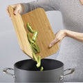 Joseph Joseph Chop2Pot Bamboo Folding Chopping Board with Non-slip Feet - YesWellness.com